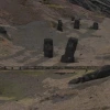 an animated scene from a digital 3D model of statues on Easter Island at sunrise
